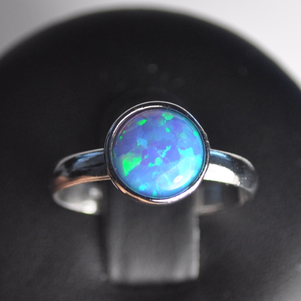 Strieborný prsteň - modrý opál, veľ. univerzálne