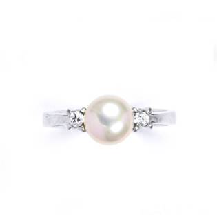 Stříbrný prsten s růžovou perlou 7,5 mm