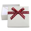 Dárková krabička na soupravu šperků, bílá s červenou mašlí