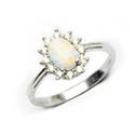 Stříbrný prsten s bílým opálem a zirkony
