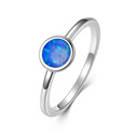 Stříbrný prsten s modrým opálem, vel. 49