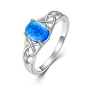 Stříbrný prsten s modrým opálem, vel. 60
